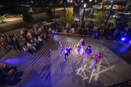 photograph of dance performance in outdoor performance space