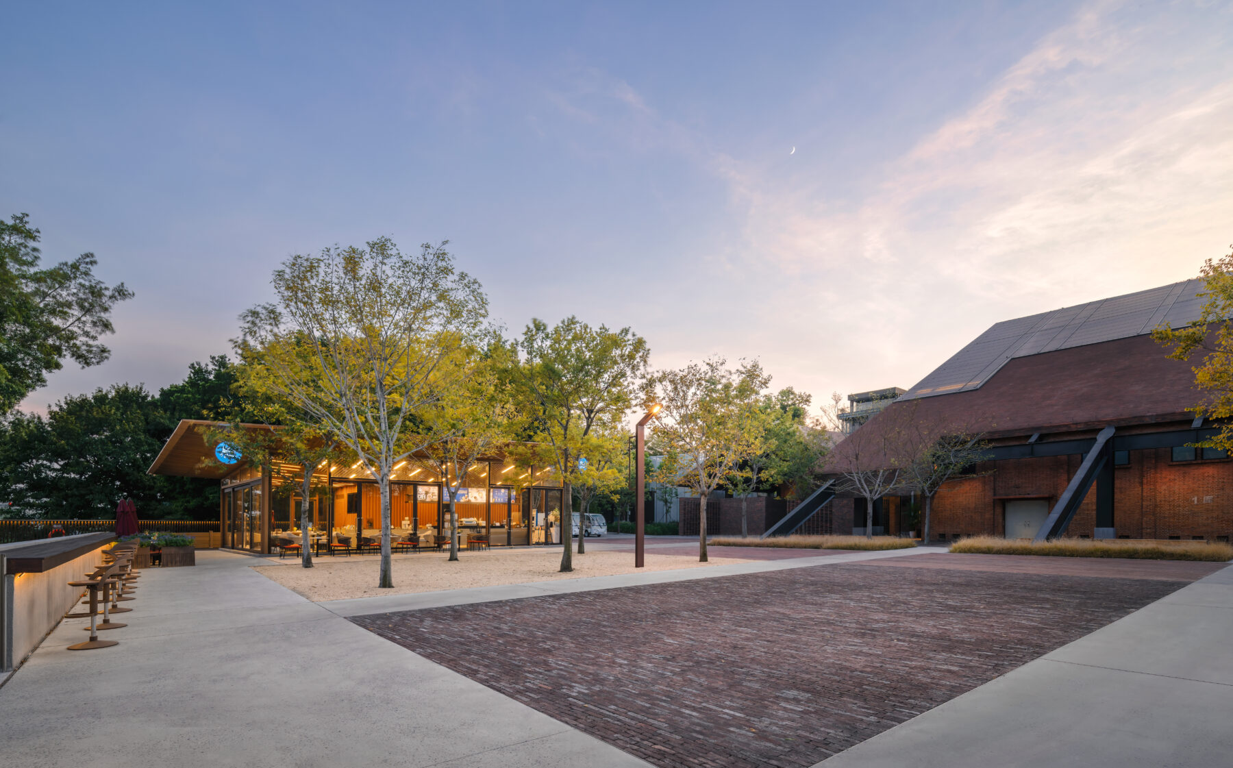 photography of the Warehouse plaza and Ficus cafe at dusk