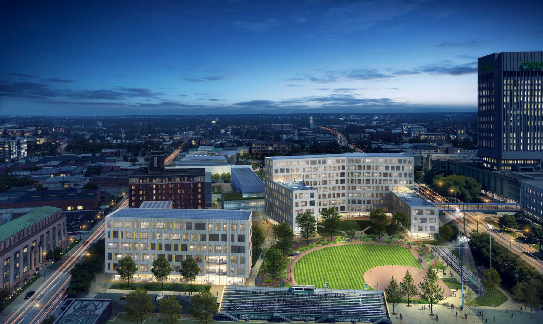 Rendered image showing night time aerial view looking east at the Residential and Athletics district